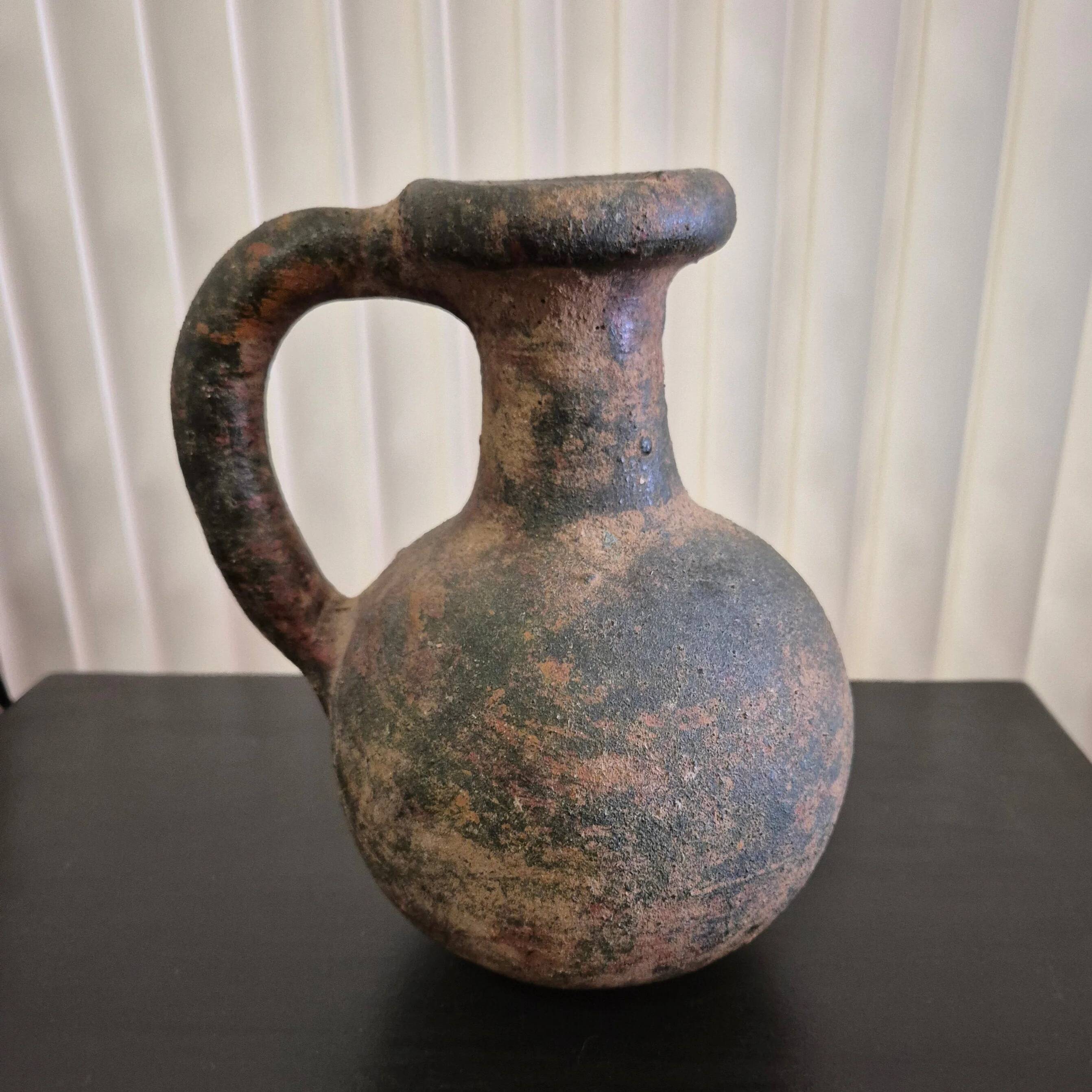 Ancient terracotta jug