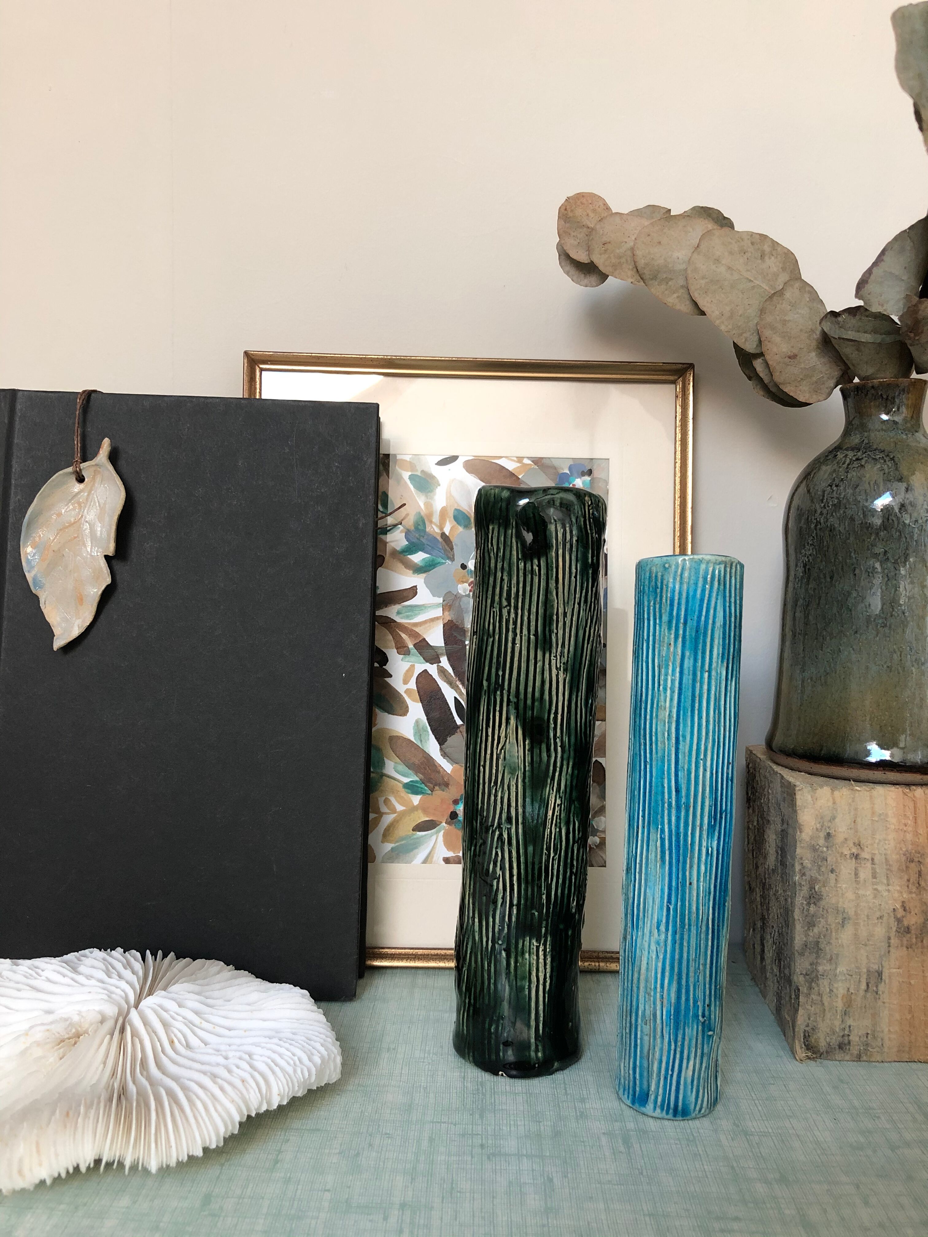 Two enamelled tubular vases