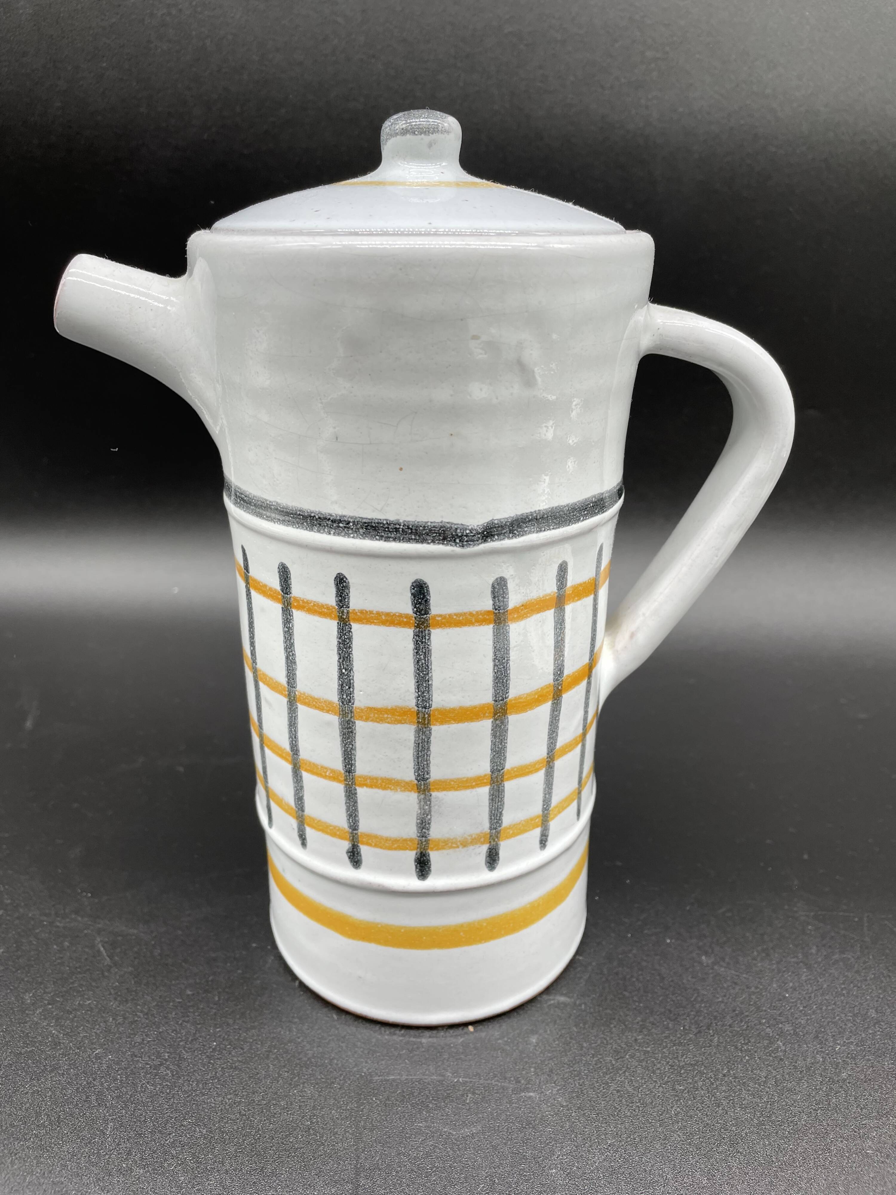 Vintage 1960s coffee service in ceramic, modernist design.