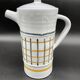 Vintage 1960s coffee service in ceramic, modernist design.