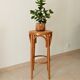 Vintage curved wooden high stool and tanned seat