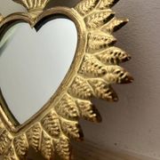 Golden ex-voto wall heart