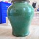 Vase en terre émaillée verte