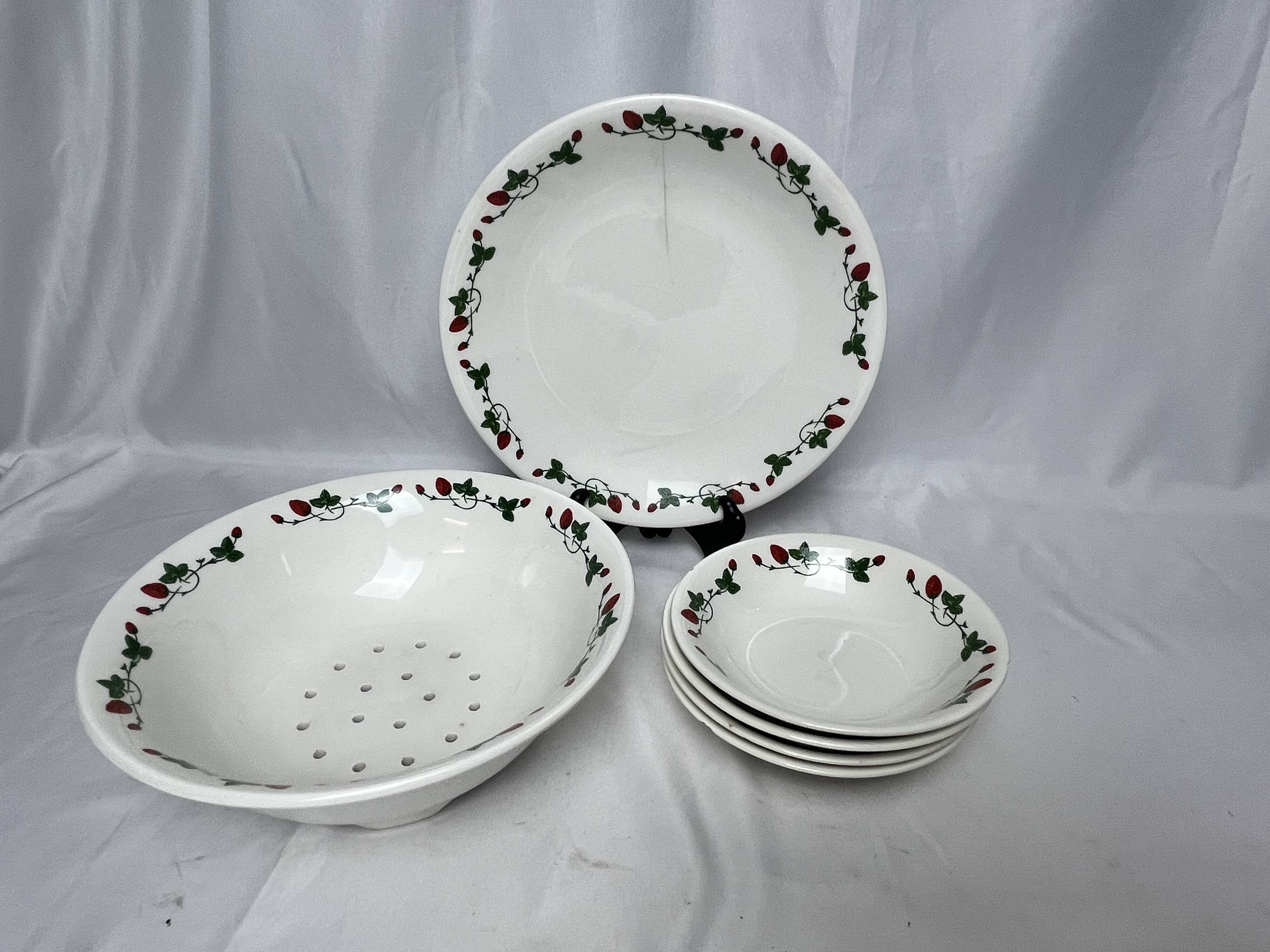 GIEN, strawberry draining bowl and earthenware dishes, 20th century