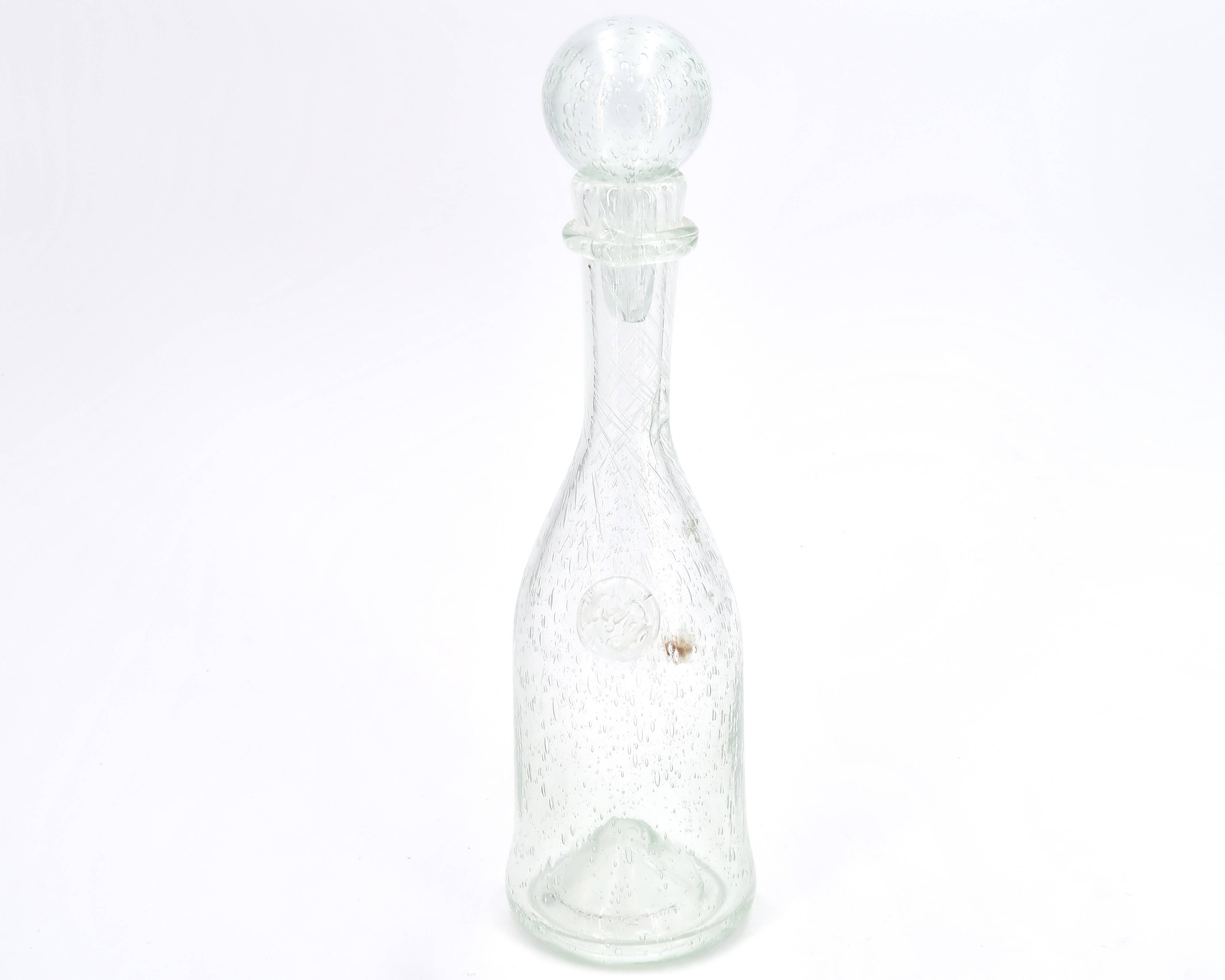 Clear bubbled glass carafe bottle from Biot, 1970s