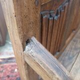 Oak church bench period XVII th century, back decorated with carved parchments