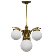 1930s Czechoslovak Art Deco brass chandelier with four opaline glass globes