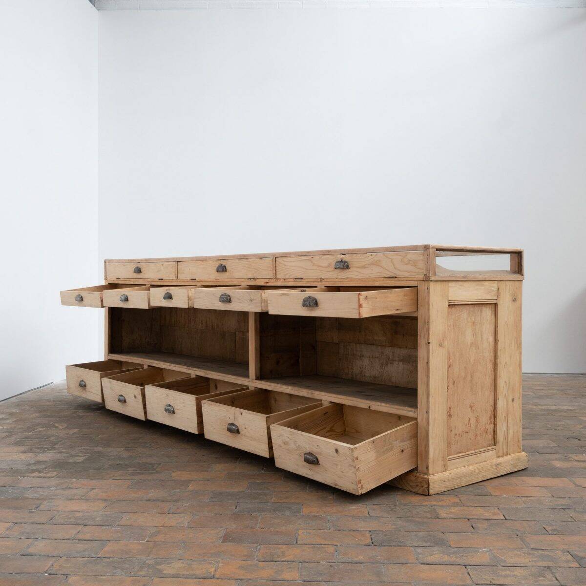 Old glass-fronted pine trade counter - early 20th century