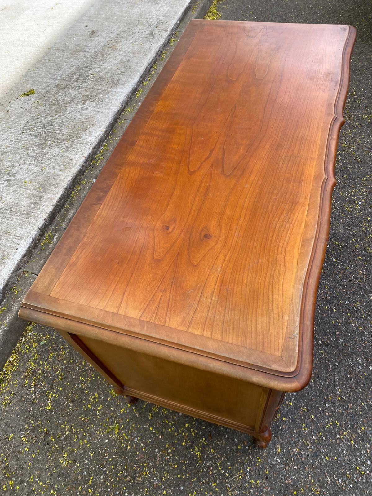 Louis XV crossbow commode in solid cherry wood from the 20th century.