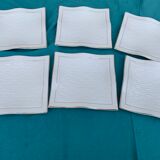 6 white glazed ceramic plates vague design and contemporary patterns