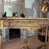 Console with 4 legs from the end of the 19th century in gilded wood in the Louis XVI style.