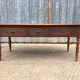 Antique Louis Philippe table in solid cherry and oak with 3 drawers