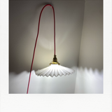 Pleated opaline suspension
