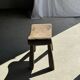 Four-legged stool in antique teak from Indonesia H 50 L 52