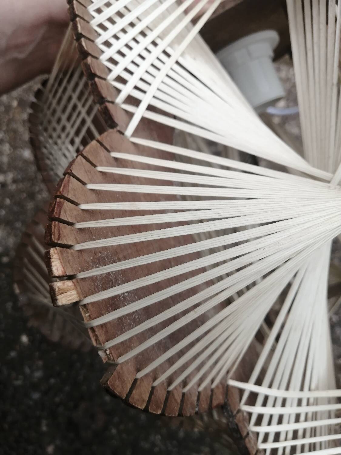 Pair of vintage wooden and rattan straw pendant lights.