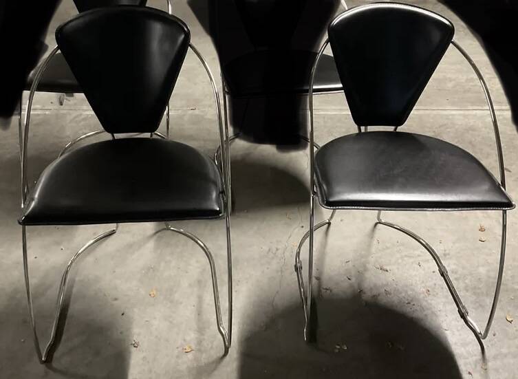 Two vintage steel and leather FIL chairs