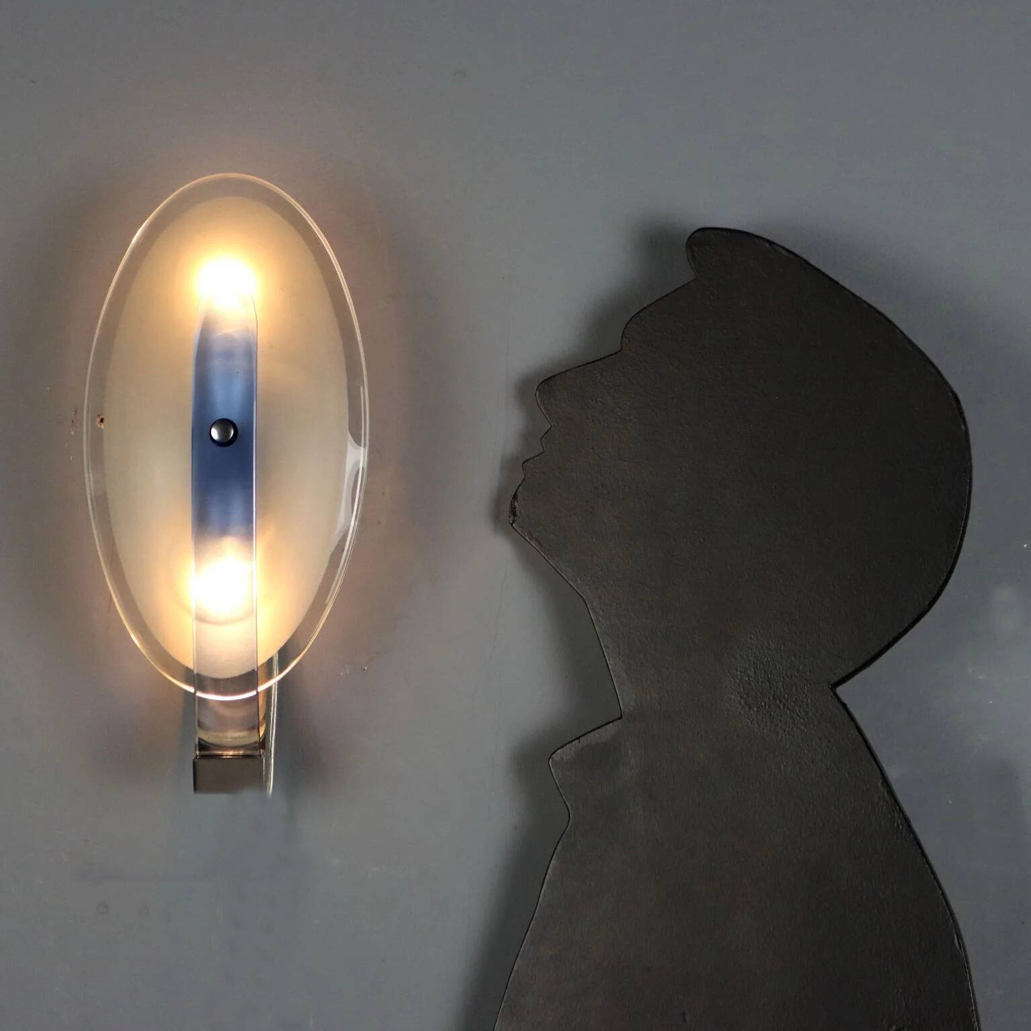 Vintage wall light in glass and metal, Italian design, 1960s.