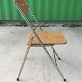 Metal folding chair and rope