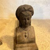 Pair of cast iron andirons with face