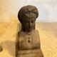 Paire de chenets en fonte visage