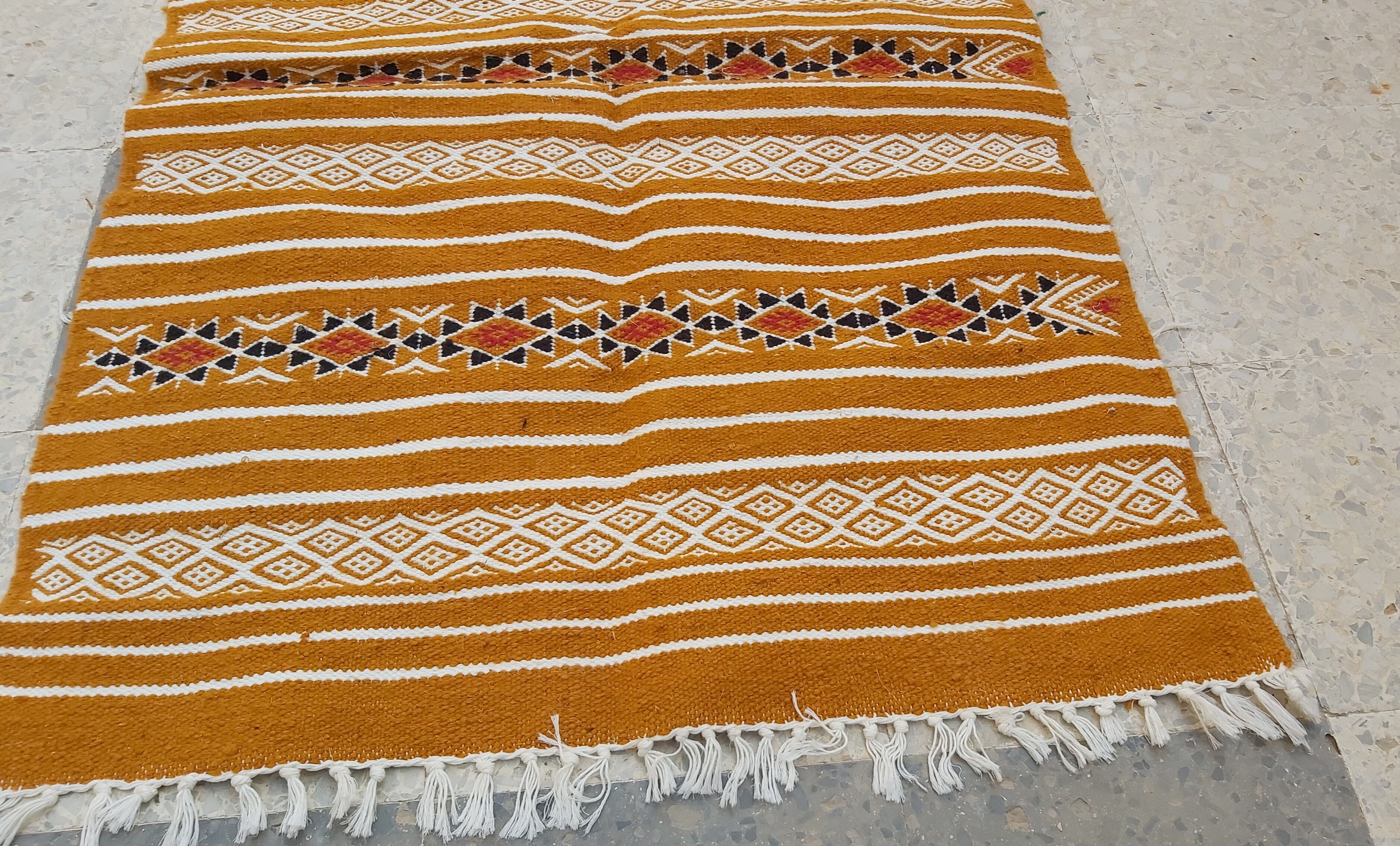 Traditional handmade small-size rug  114x64cm