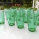 12 vintage Lesieur green glasses.