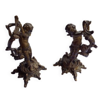 Old cherubs candlesticks