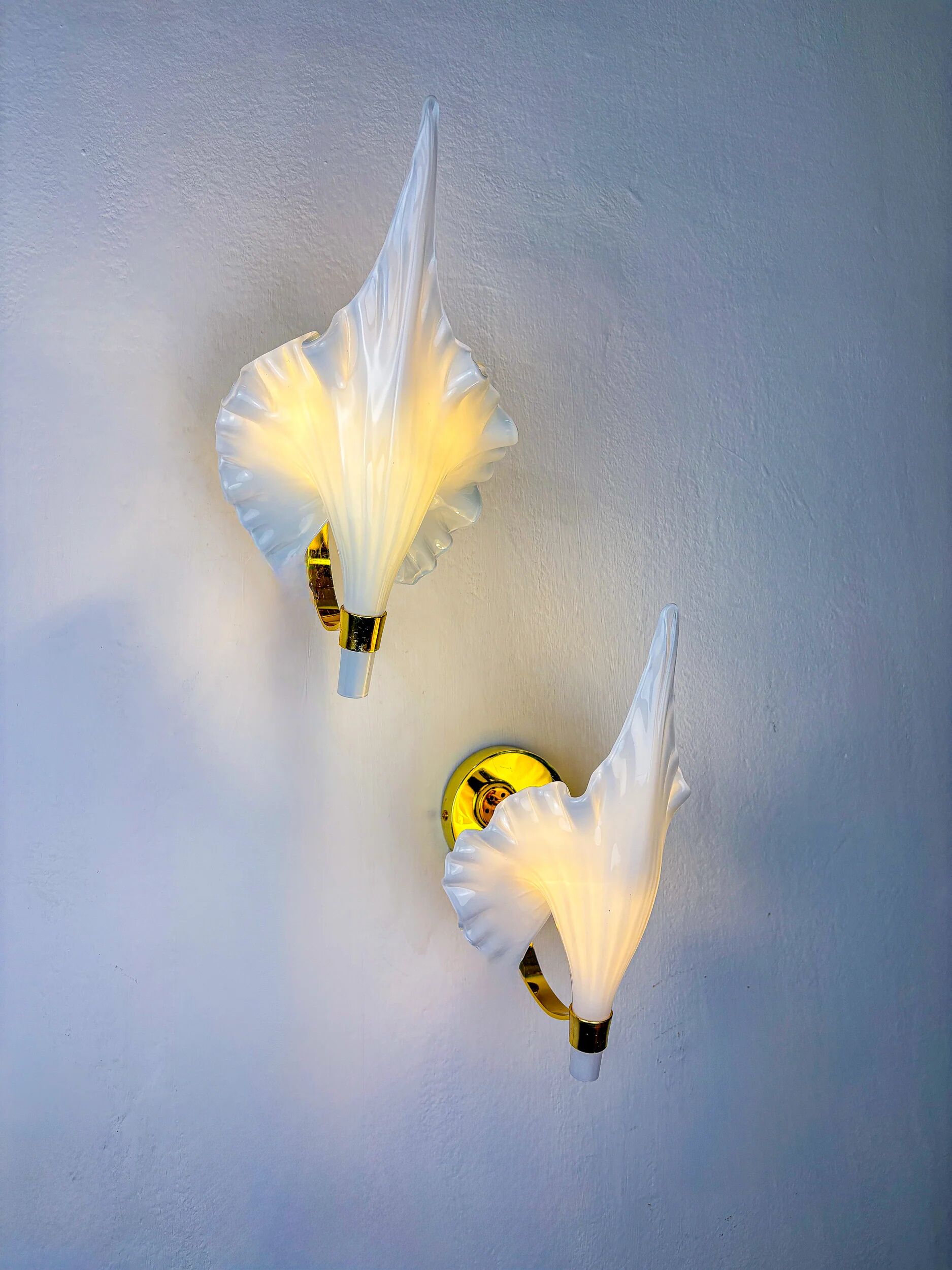 Pair of Italian "Calla Lily" leaf-shaped wall sconces, Murano glass & gilt brass, circa 1970s