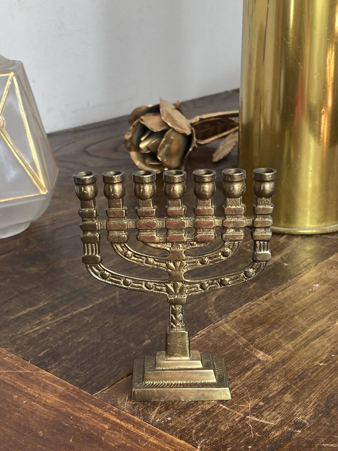 Chandelier, seven-branched menorah, in brass.