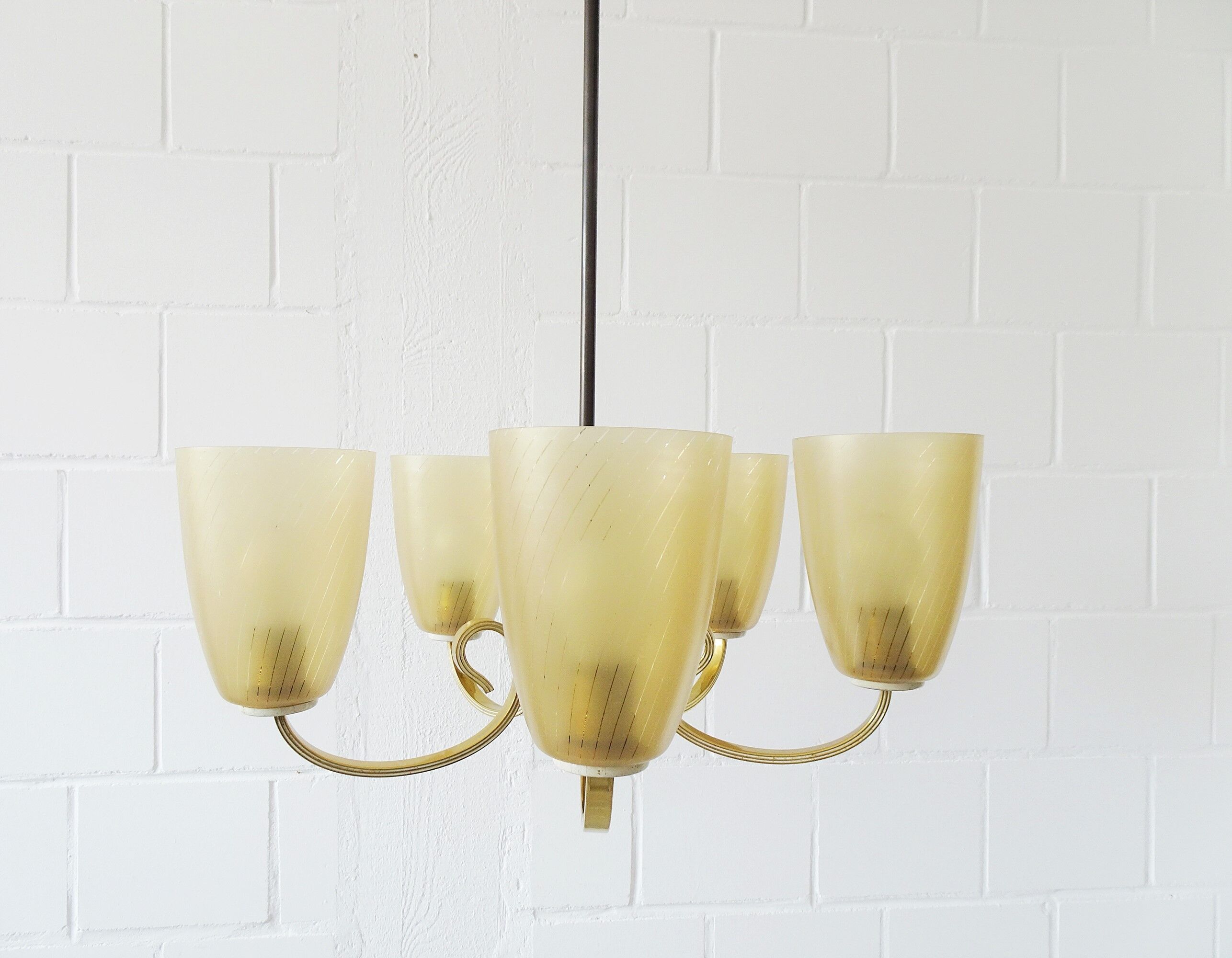 Five-armed chandelier made of brass and glass