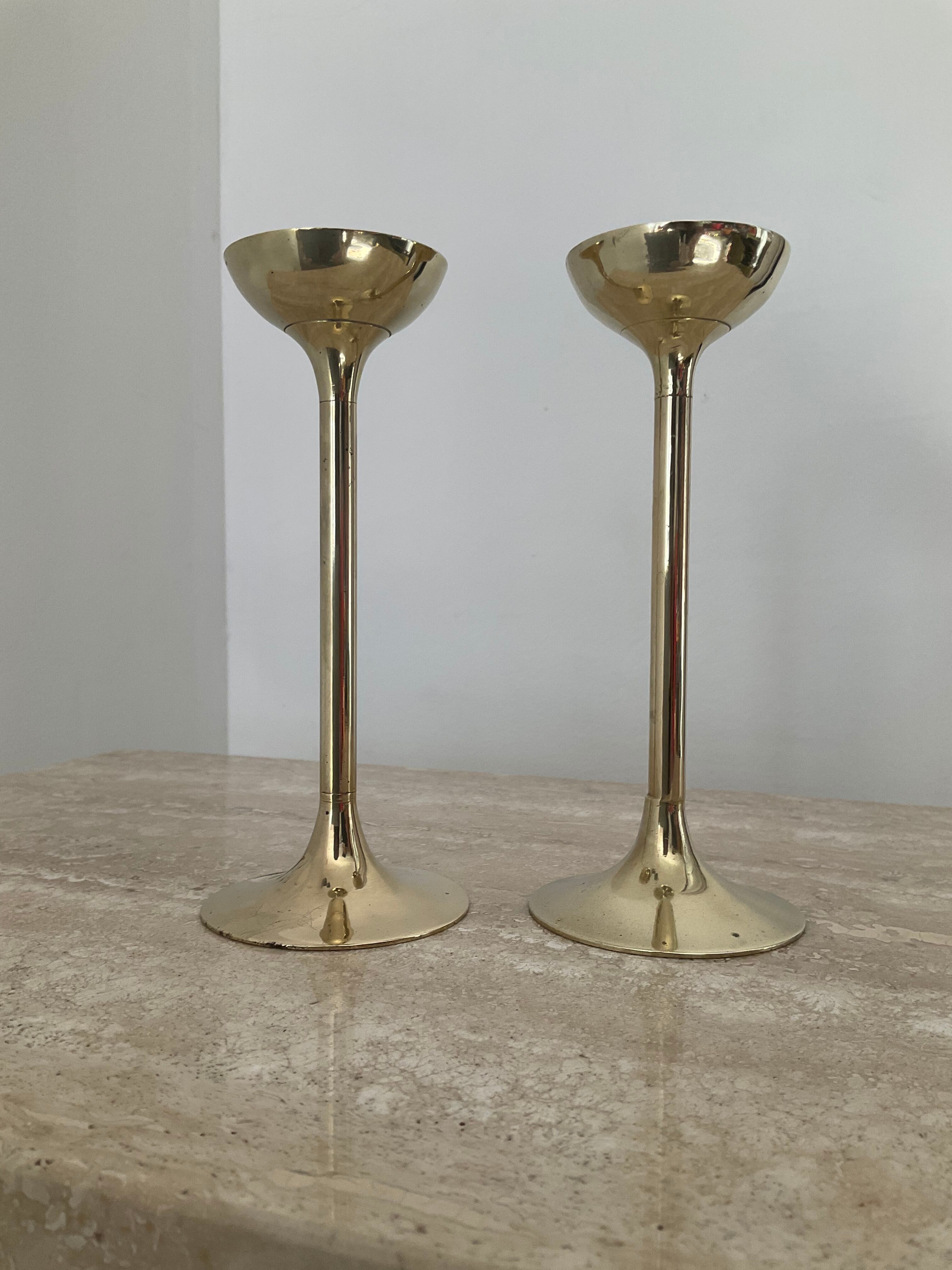 Pair of antique bronze candle holders