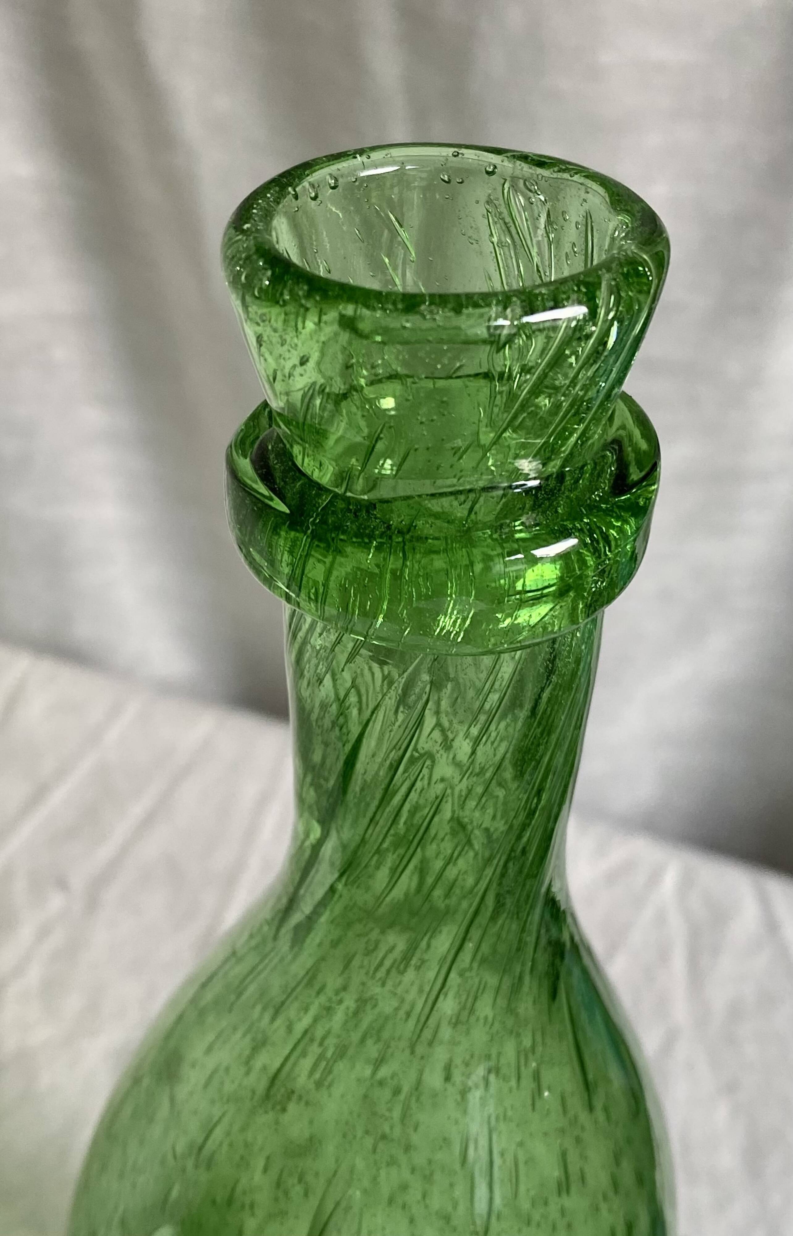 Biot-signed bubble glass bottle, green carafe