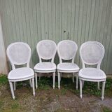 4 old wooden and cane chairs