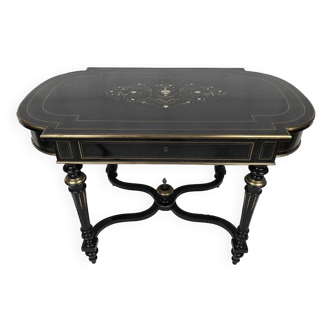 Black lacquered wooden table with central decoration inlaid with brass, Napoleon III