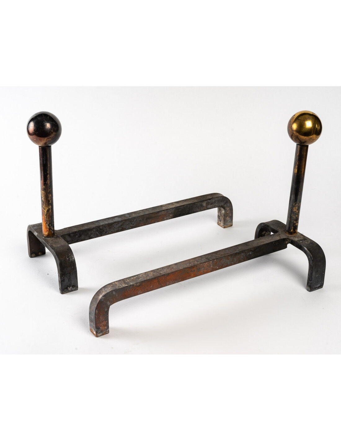 Pair of cast iron and brass chenets, 1960