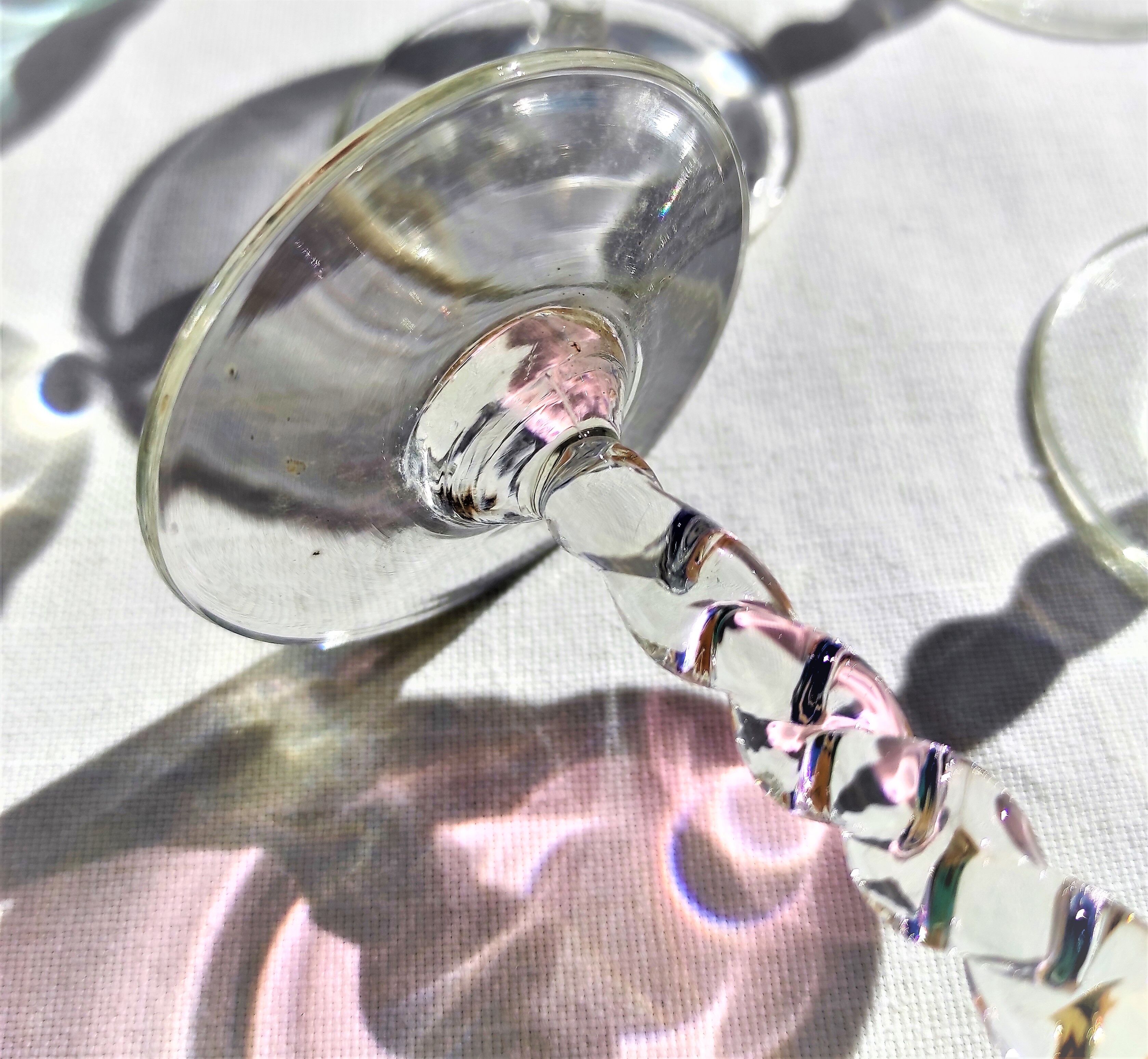 Twisted foot glasses of different color