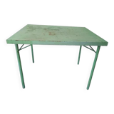 Green garden table in patinated metal