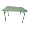 Green garden table in patinated metal