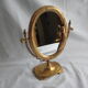 Rotating mirror in psychedelic brass