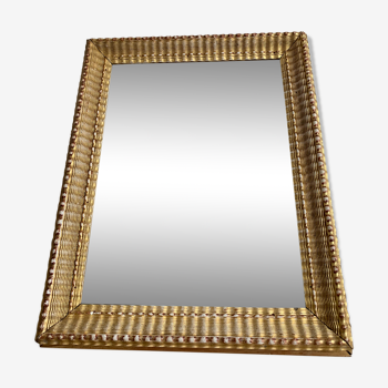 Miroir en bois sculpté et doré 44x56cm