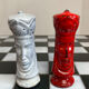 Chess set with ceramic board and pieces.