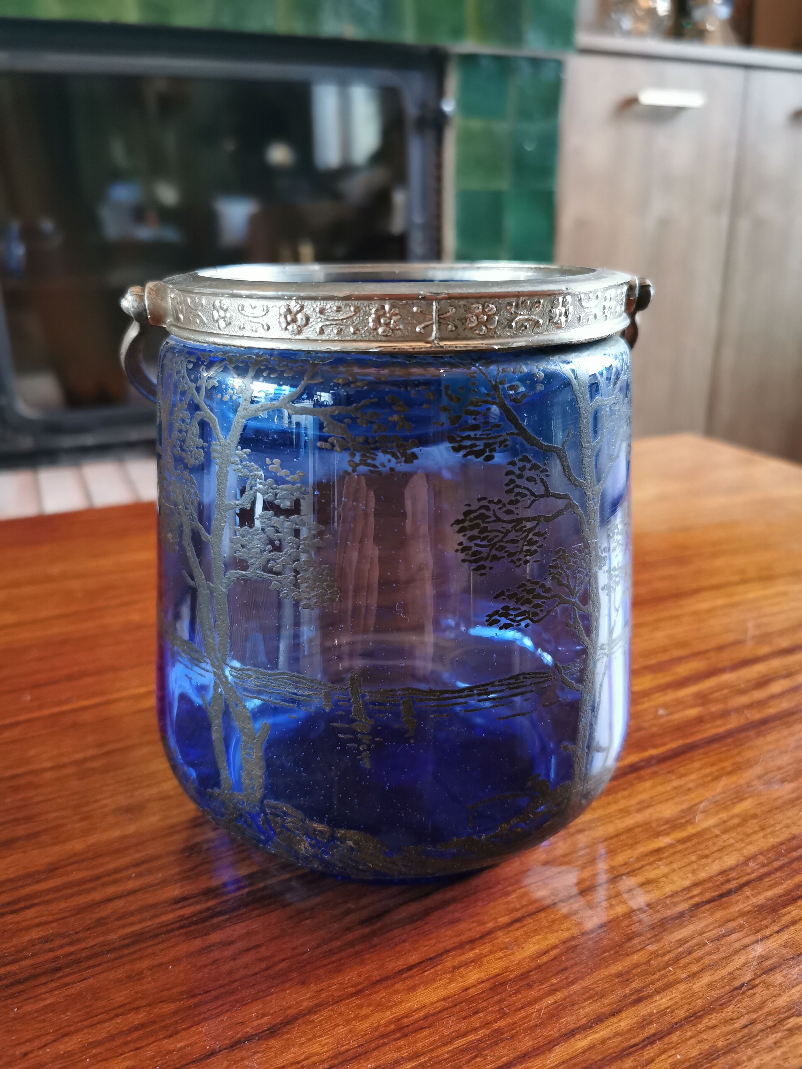 Old ice or biscuit bucket made of golden decor blue glass
