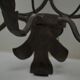 Pair of grey patinated iron wall lamps