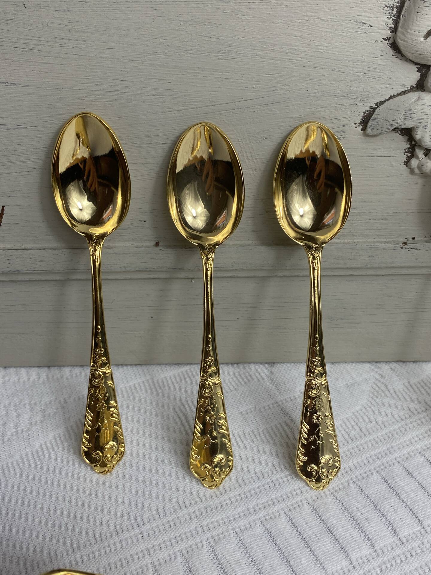 Dessert spoons and serving ladle