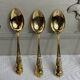 Dessert spoons and serving ladle