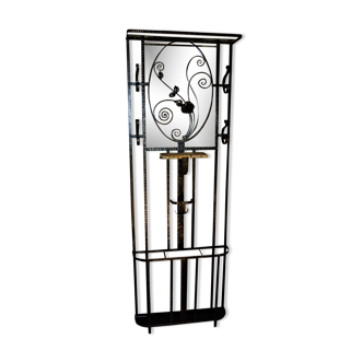 Wrought iron wardrobe with oval mirror