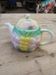 Antique teapot in slip