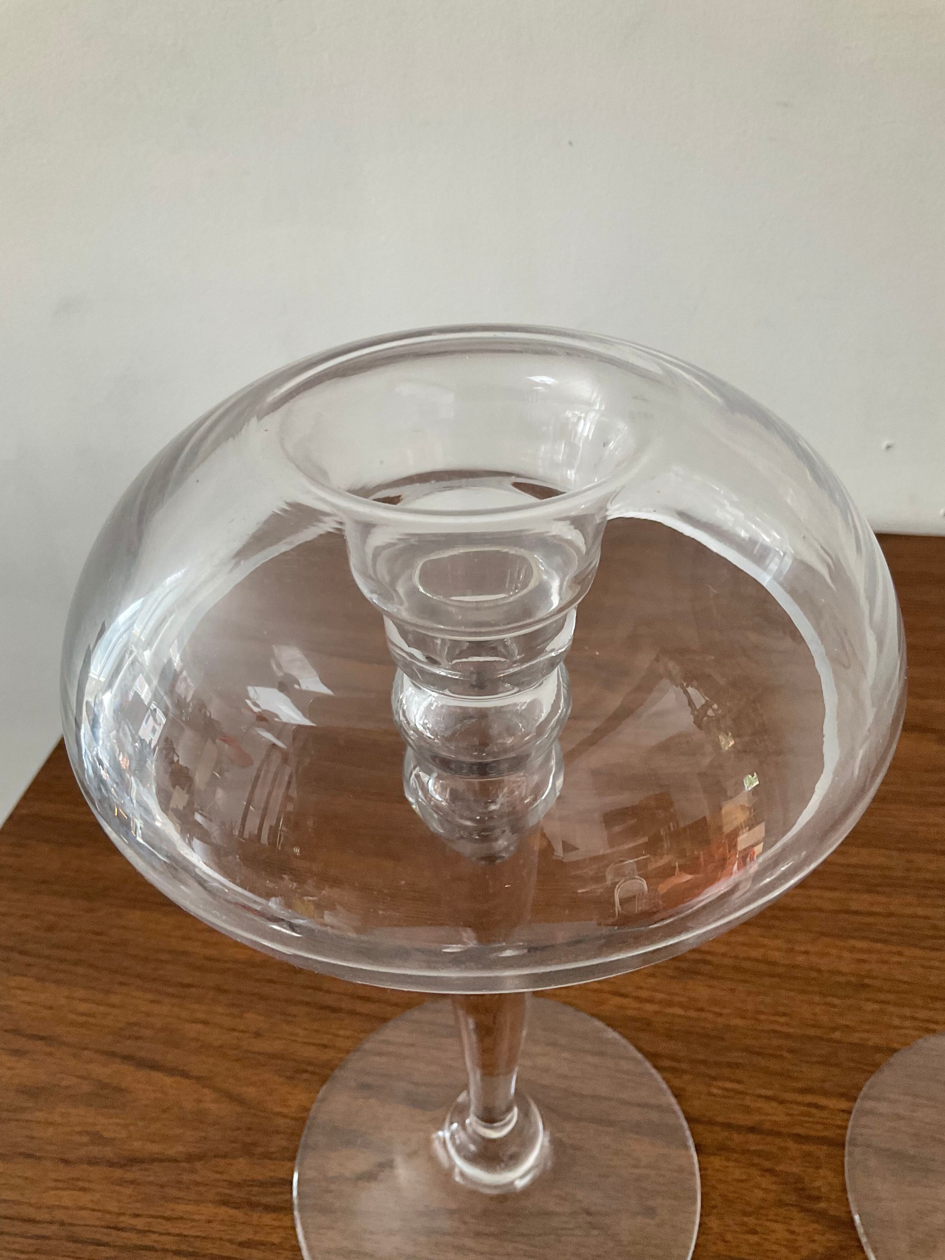 Pair of candle holders in glass paste