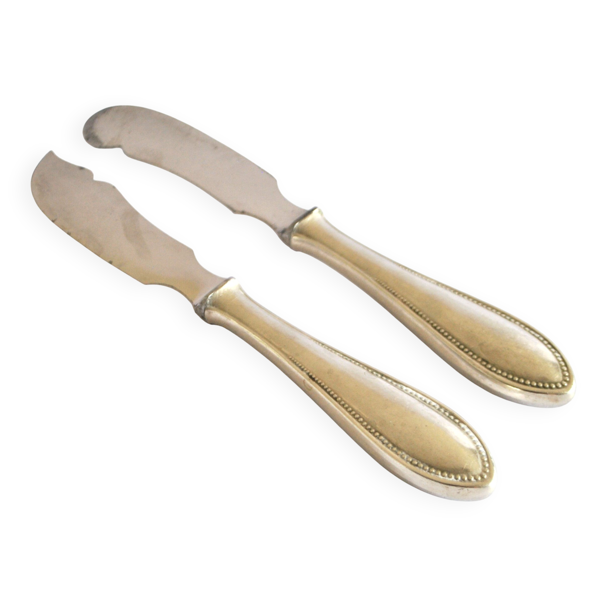Two antique service knives in silver-plated metal, pearl frieze gowe alpacca.