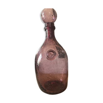 Biot blown and bubbled glass bottle